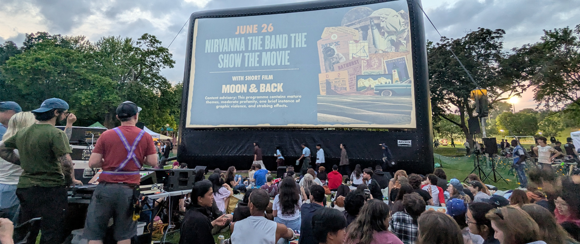 Toronto Outdoor Picture Show attendees enjoying a movie outside on the projector in Christy Pits Park.