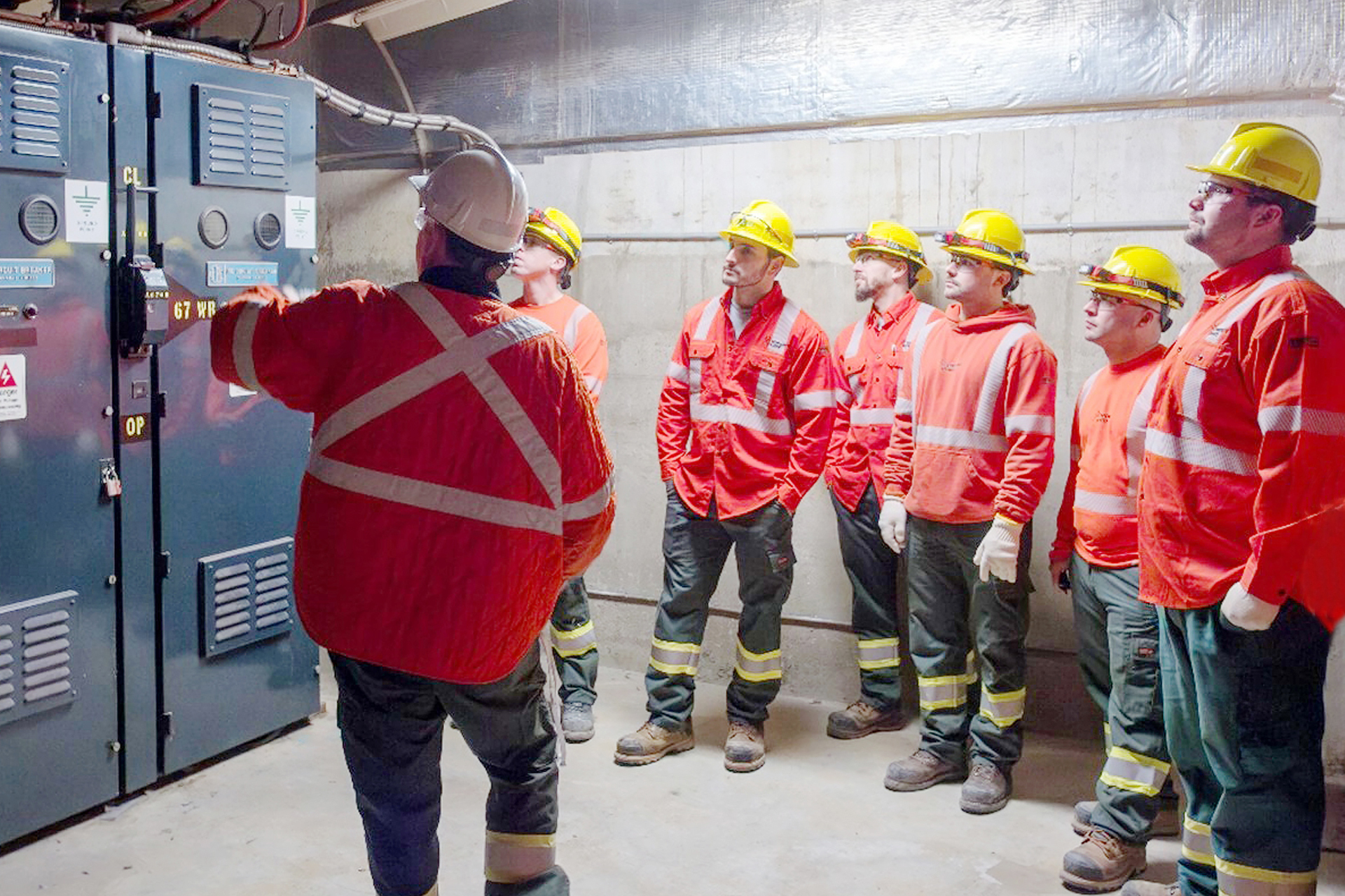 Toronto Hydro crew members in an electrical vault at the CN Tower.